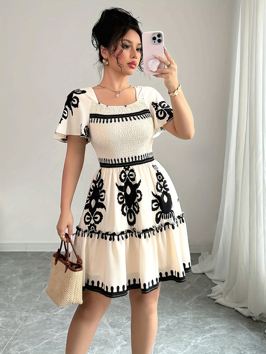 Elegant Mini Dress with a Square Neckline, Featuring Fashionable Prints, Pleats, a Cinched Waist for a Slimming Effect, And Ruffled Edges with an A-Line Hem.