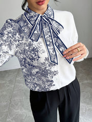 Women's Elegant Blouse - Semi-Sheer Buttoned-up Shirt with Floral bow tie, White & Navy Blue Floral Print, Long Sleeve Office Party Top for Women, Sophisticated Attire, Classic Collared Design, Detailed Print Design